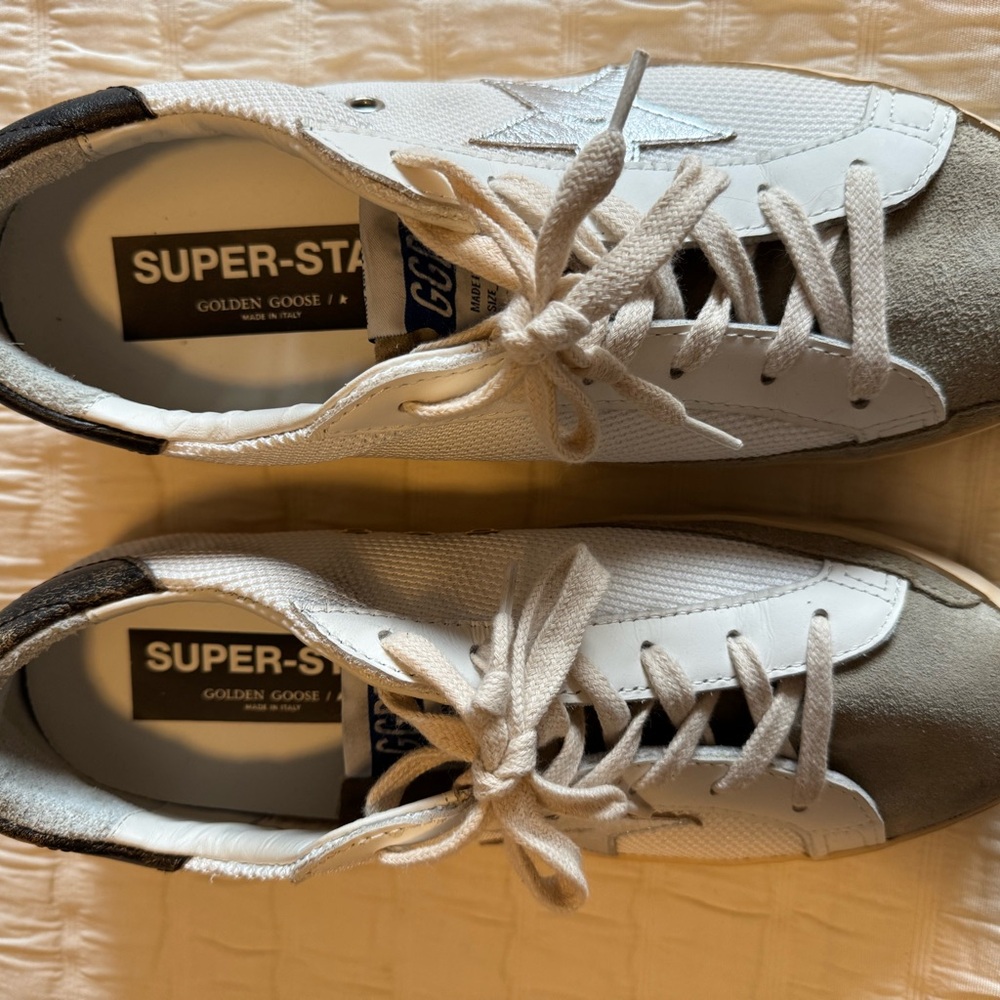 Golden goose sneakers made in Italy 
Worn oncetoo smalll for mePerfect condition